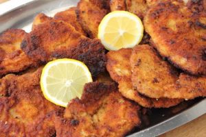 Tag words: schnitzel recipe, chef Ed, Wiener Schnitzel, pork schnitzel, chicken schnitzel, German food, Austrian cuisine, comfort food, traditional schnitzel, how to make schnitzel, European recipes, golden crust, crispy schnitzel, homemade schnitzel, breaded cutlet, meat recipe, veal schnitzel, classic dinner, schnitzel history, cultural food, fried meat, holiday food, German dinner, easy dinner idea, protein meal, traditional dish, lemon schnitzel, breadcrumb recipe, culinary classic, chef Ed recipe, meat lover, schnitzel side dishes, clarified butter, pan-fried schnitzel, schnitzel meal, food heritage, world cuisine, European classic, dinner for four, home cooking, schnitzel tips, German cooking, heritage food, iconic dish, recipe history, schnitzel with salad, meat main course, schnitzel tradition