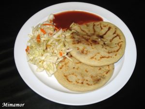 Keywords: pupusas, Salvadoran food, cheese pupusa, pupusas revueltas, masa harina recipe, Chef Ed, curtido slaw, salsa roja, Central American street food, grilled pupusa, gluten-free Latin food, Latin comfort food, pupusas de queso, pork pupusa, authentic pupusas, Loroco filling, homemade tortillas, Salvadoran cuisine, El Salvador recipes, Latin cheese dish, Latin American cuisine, fermented cabbage, healthy Latin meals, corn tortilla pupusa, stuffed masa dough, cheesy Latin snack, meat and cheese pupusa, pupusas tradition, Chef Ed pupusa recipe
