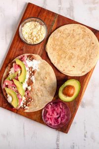 Keywords: baleadas, Honduras food, Chef Ed recipe, grilled meats, Latin street food, refried beans, flour tortilla, carne asada baleada, grilled pork baleada, grilled chicken baleada, authentic Honduran recipe, Latin American cuisine, comfort food, protein-packed meal, street food fusion, traditional Central American food, crema and queso, handmade tortillas, flavorful fillings, food truck favorite, hearty baleadas, layered tortillas, avocado and beans, grilled meat wrap, Latin fusion food, Chef Ed baleadas, Central American recipes, tasy baleada comboChef