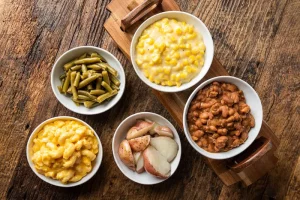 Keywords: grilled pork chops, Texas Roadhouse pork chops, Chef Ed recipe, pork chop marinade, applesauce side, grilled meat, southern comfort food, BBQ pork chops, smoky pork, family dinner, pork dinner, easy grilling recipe, savory pork rub, thick cut chops, juicy pork chops, comfort food sides, mashed potatoes, green beans, baked beans, grilled corn, pork and apples, summer BBQ, backyard grilling, pork chop seasoning, roadhouse meal, BBQ dinner, meat lover's recipe, sweet and savory combo, grilled entree, bone-in pork recipe.