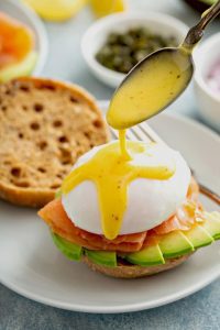 eggs benedict, Chef Ed brunch, poached eggs recipe, hollandaise sauce, smoked salmon breakfast, healthy brunch, protein-rich breakfast, elegant brunch recipe, English muffin eggs, eggs royale, capers and salmon, tomato and egg muffin, gourmet breakfast, brunch for athletes, omega-3 breakfast, homemade hollandaise, egg yolk sauce, breakfast with salmon, chef Ed kitchen, post workout breakfast, high protein eggs, healthy fats, smoked salmon recipe, easy poached eggs, brunch favorite, seafood breakfast dish, tomato egg stack, athletic brunch, savory English muffin recipe, best brunch ideas