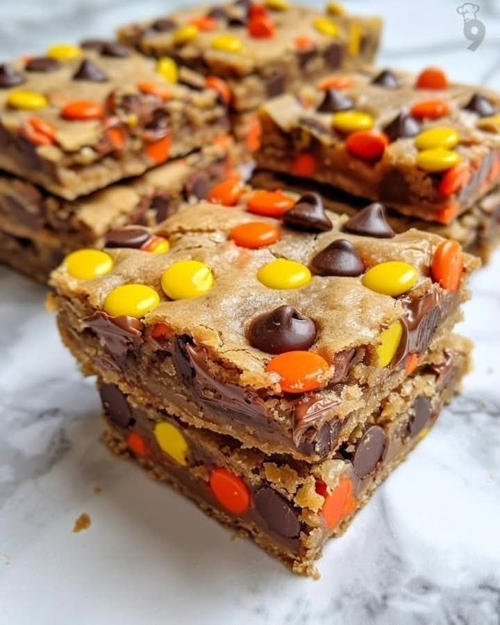 Reese’s Pieces cookies, chocolate chip cookies, peanut butter candy, Chef Ed, cookie recipe, best cookies, soft cookies, chewy cookies, homemade dessert, colorful cookies, chocolate lovers, peanut butter lovers, baking at home, comfort food, oven fresh, classic cookies, gourmet cookies, fun baking, easy dessert, sweet treat, milk and cookies, edible gift, kid-friendly recipe, cookie dough, bake sale cookies, fall desserts, candy cookies, Halloween cookies, crunchy candy cookies, snack ideas, chewy chocolate chip, cookie tray, ultimate cookie, fresh baked, family favorite, dessert time, party treats, kitchen fun, American dessert, nostalgic treat, holiday baking, cookie addiction, food styling, sweet craving, baking joy, edible happiness