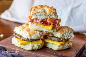 Keywords: breakfast biscuit, biscuit sandwich, bacon egg cheese biscuit, sausage biscuit, Chef Ed recipe, southern breakfast, hearty breakfast, cheddar biscuit, homemade breakfast, brunch sandwich, breakfast roll, egg sandwich, biscuit breakfast recipe, quick breakfast, easy morning meal, comfort food, morning sandwich, hot breakfast sandwich, savory biscuit, buttery biscuit, sausage and egg, stacked sandwich, skillet breakfast, cheesy breakfast, grab and go breakfast, loaded biscuit, biscuit recipe, protein breakfast, biscuit meal, breakfast layers.
