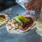 Baleadas from Honduras with grilled chicken, steak, and pork—Chef Ed's gourmet street food upgrade.