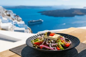 greek salad, Chef Ed, Mediterranean diet, healthy salad, feta cheese, Kalamata olives, red onion, cucumber, tomatoes, olive oil dressing, summer salad, refreshing salad, low carb, vegetarian, heart healthy, fresh ingredients, traditional Greek food, no lettuce salad, rustic salad, quick salad, healthy fats, red wine vinegar, oregano, authentic Greek salad, easy Mediterranean recipe, high fiber salad, raw veggies, salad with olives, healthy lunch, light dinner, Greek cuisine, simple salad