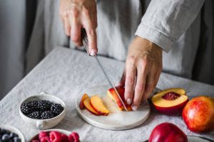 **Chef Ed’s Recipe – Fresh Fruit Salad with a Red Wine Twist** *Vibrant, juicy, and laced with just the right splash of red wine* --- **Prep Time:** 15 minutes **Cook Time:** 0 minutes **Soak Time:** 10 minutes (optional for wine infusion) **Total Time:** 25 minutes **Servings:** 4 --- ### Ingredients: * 1 cup strawberries, hulled and halved * 1 cup pineapple chunks * 1 cup seedless green grapes, halved * 1 cup watermelon, cubed * 1 kiwi, peeled and sliced * 1 mango, peeled and diced * 1 orange, peeled and segmented * 2 tablespoons honey * Juice of ½ lime * 3 tablespoons dry red wine (Cabernet Sauvignon or Merlot work well) * Optional: fresh mint leaves for garnish --- ### Instructions: #### 1. **Prepare the Fruit:** Wash and dry all fruit. Slice, dice, or cube into bite-sized pieces and place in a large mixing bowl. Use a sharp knife to keep the fruit shapes clean and appealing. #### 2. **Mix the Dressing:** In a small bowl, whisk together the honey, lime juice, and red wine until fully blended. The lime cuts the richness of the wine while enhancing the fruit's natural flavors. #### 3. **Combine and Toss:** Pour the red wine dressing over the fruit. Gently toss with a large spoon or spatula until everything is evenly coated. Avoid overmixing to preserve the integrity of soft fruits like kiwi and watermelon. #### 4. **Chill and Serve:** Cover and refrigerate for 10 minutes to allow the flavors to meld. Garnish with fresh mint just before serving for a cool, aromatic touch. --- ### Serving Tip: Serve in chilled bowls or, for a dramatic presentation, scoop the fruit salad into a **hollowed-out watermelon half**. Perfect for brunches, BBQs, or romantic dinners. --- ### Chef Ed's Tip: The wine adds an elegant depth, so choose a bottle you’d happily sip. For a sweeter version, use a red Moscato or add an extra spoon of honey. --- **References:** * [https://www.simplyrecipes.com/recipes/fresh\_fruit\_salad/](https://www.simplyrecipes.com/recipes/fresh_fruit_salad/) * [https://www.foodnetwork.com/recipes/food-network-kitchen/red-wine-fruit-salad-3362742](https://www.foodnetwork.com/recipes/food-network-kitchen/red-wine-fruit-salad-3362742) --- **Meta description:** Chef Ed’s fruit salad gets a bold upgrade with a splash of red wine and lime. **Keywords:** fruit salad, red wine fruit salad, Chef Ed, refreshing dessert, wine infused salad, healthy snack, summer salad, tropical fruit mix, honey lime dressing, watermelon bowl, party fruit salad, easy fruit dish, no cook recipe, mint garnish, sweet salad, fruit cocktail, brunch salad, alcohol in dessert, elegant fruit bowl, chilled salad, sweet wine fruit mix, fruit with red wine, colorful salad, antioxidant-rich snack, hydrating fruit mix, wine twist, gourmet fruit salad, healthy side dish, fruit salad with honey, refreshing summer recipe, chef recipe.