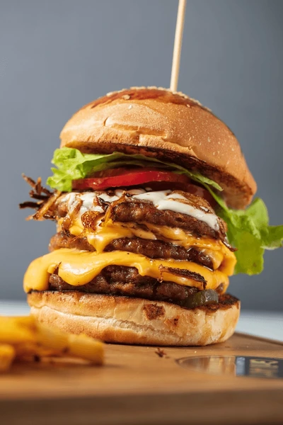 cheddar burger, extra cheese burger, double burger, triple burger, cheeseburger, gourmet burger, Chef Ed, beef burger, grilled burger, smashed burger, loaded burger, juicy burger, cheddar cheese, burger recipe, homemade burger, cheesy burger, cheddar lovers, comfort food, American burger, burger night, diner food, melty cheese, cheese stacked, big burger, fast food style, restaurant-style burger, cheddar melt, burger ideas, grilling recipes, barbecue burger, stacked cheeseburger, burger buns, brioche burger, cheddar patty, burger dinner, meat lovers, indulgent burger, burger creation, ultimate burger, monster burger, backyard burger, grill season, burger inspiration, cheesy meal, over-the-top burger, cheddar explosion, mouthwatering burger, easy burger recipe, cheddar tower, burger toppings