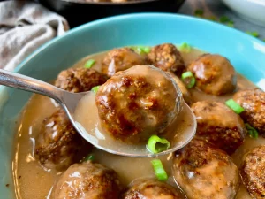 meatballs, brown sauce, Chef Ed, beef meatballs, pork and beef, savory dinner, classic comfort food, skillet meal, mashed potatoes and gravy, rich sauce, gravy meatballs, juicy meatballs, easy dinner, homemade recipe, sauce from scratch, buttery roux, egg noodles, Swedish meatballs, hearty meal, ground beef, kitchen comfort, rich beef sauce, family dinner, tasty meatballs, meatball recipe, simple brown sauce, rustic dinner, gourmet home cooking, oven to table, parsley garnish, meatball gravy, creamy sauce option, ultimate meatballs, skillet dish, home-style cooking, indulgent sauce, cozy food, classic gravy, ground pork option, satisfying meal, winter comfort, stovetop recipe