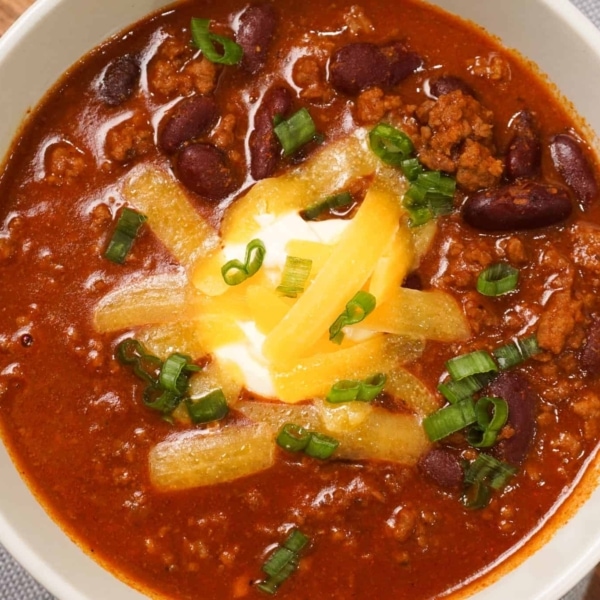 red bean chili, Texas chili, Chef Ed recipe, beef chili, spicy chili, beef tips chili, ground beef recipes, chili with beans, hearty chili, cowboy chili, stew tips, chili powder, comfort food, meal prep, game day chili, tomato-based chili, onion and garlic, bell pepper chili, cumin chili, paprika chili, jalapeño chili, homemade chili, southern chili, cast iron chili, Dutch oven chili, chili for winter, chili night, beef stew meat, beefy chili, red pepper chili, Texas-style cooking